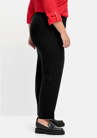 SHEEGO Regular Trousers in Black