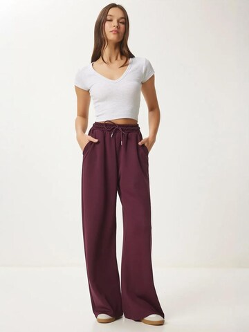 Wide leg Pantaloni di Happiness İstanbul in rosso