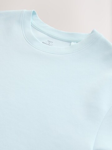 Tricou de la Next pe albastru
