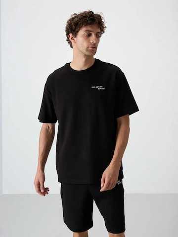 Completo sportivo di Tommy Life in nero