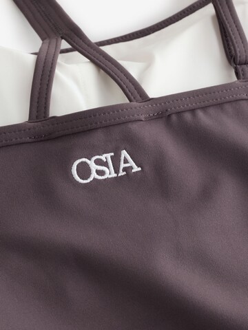 Top di Osia in marrone