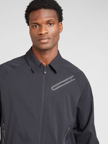 UNDER ARMOUR Spordijope 'Unstoppable Vent', värv must