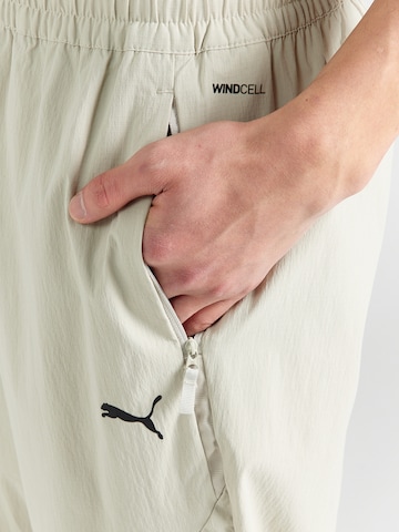 PUMA Lużny krój Spodnie sportowe 'PUMATECH' w kolorze beżowy