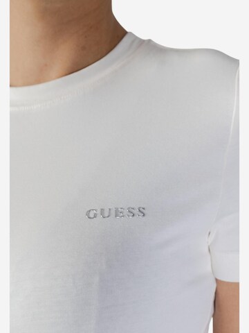 Top 'TRACEY CN SS T-SHIRT V6RI07 J1314' di GUESS in beige