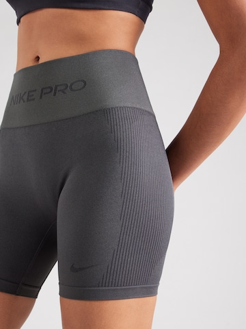 NIKE Skinny Sportnadrágok - szürke