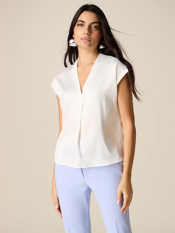 Maglietta di oltre in bianco