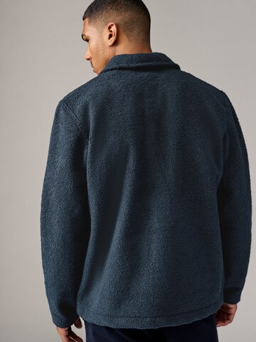 Next Tussenjas in Blauw