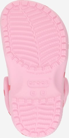 Chaussures ouvertes Crocs en rose