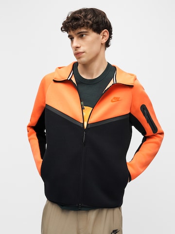 Nike Sportswear Tréning dzseki 'Tech Fleece' - narancs