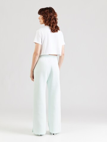 Wide leg Pantaloni 'PHNX FLC' de la Nike Sportswear pe verde