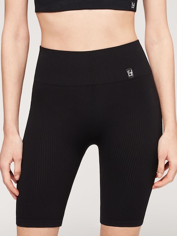 CALZEDONIA Skinny Leggings in Black: front