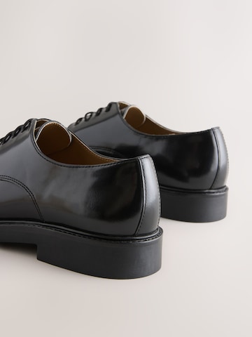 Chaussure à lacets Next en noir
