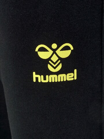 Effilé Pantalon Hummel en noir