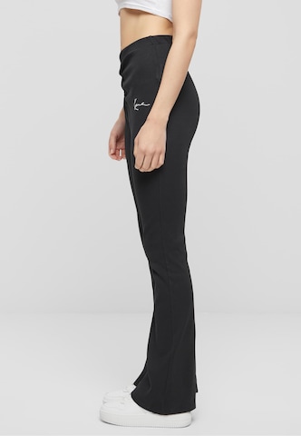 évasé Pantalon Karl Kani en noir