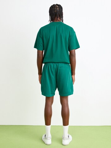 ELLESSE Loosefit Broek 'Zanica' in Groen