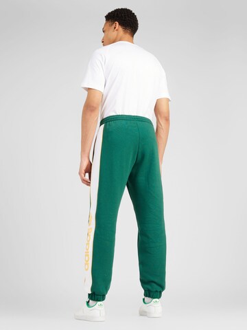 ADIDAS ORIGINALS Дънки Tapered Leg Панталон в зелено