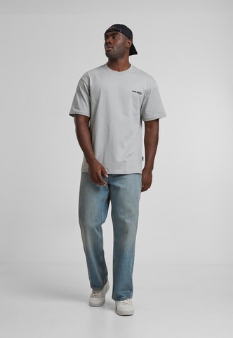 Karl Kani Bluser & t-shirts 'Woven Signature Resist Love' i grå