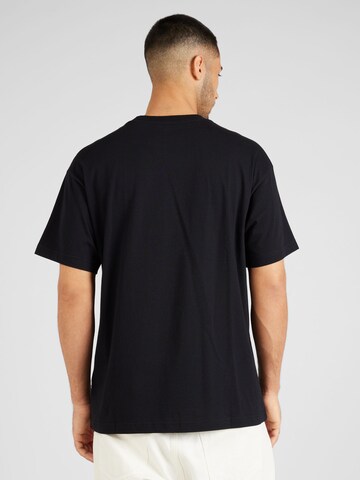 Carhartt WIP - Camiseta 'Heart Progress' en negro