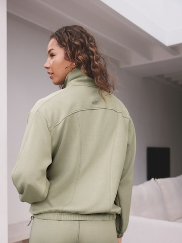 Felpa di self. in verde