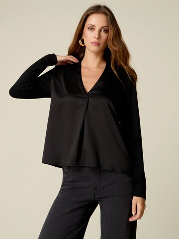 Camicia da donna di oltre in nero