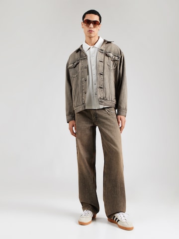 LEVI'S ® Преходно яке 'Relaxed Type III Trucker Jacket' в сиво