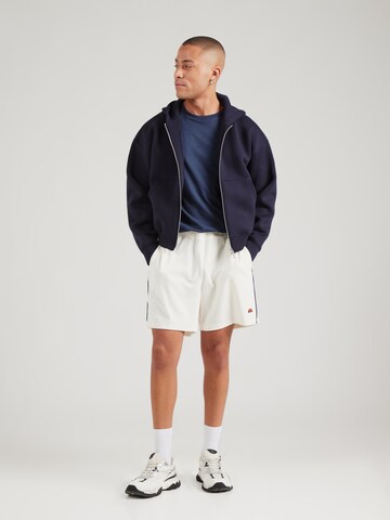 ELLESSE Loose fit Trousers 'ONORATI' in White