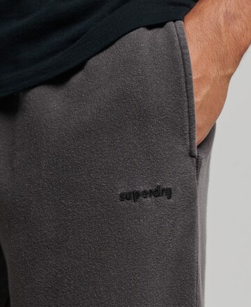 Effilé Pantalon de sport Superdry en gris