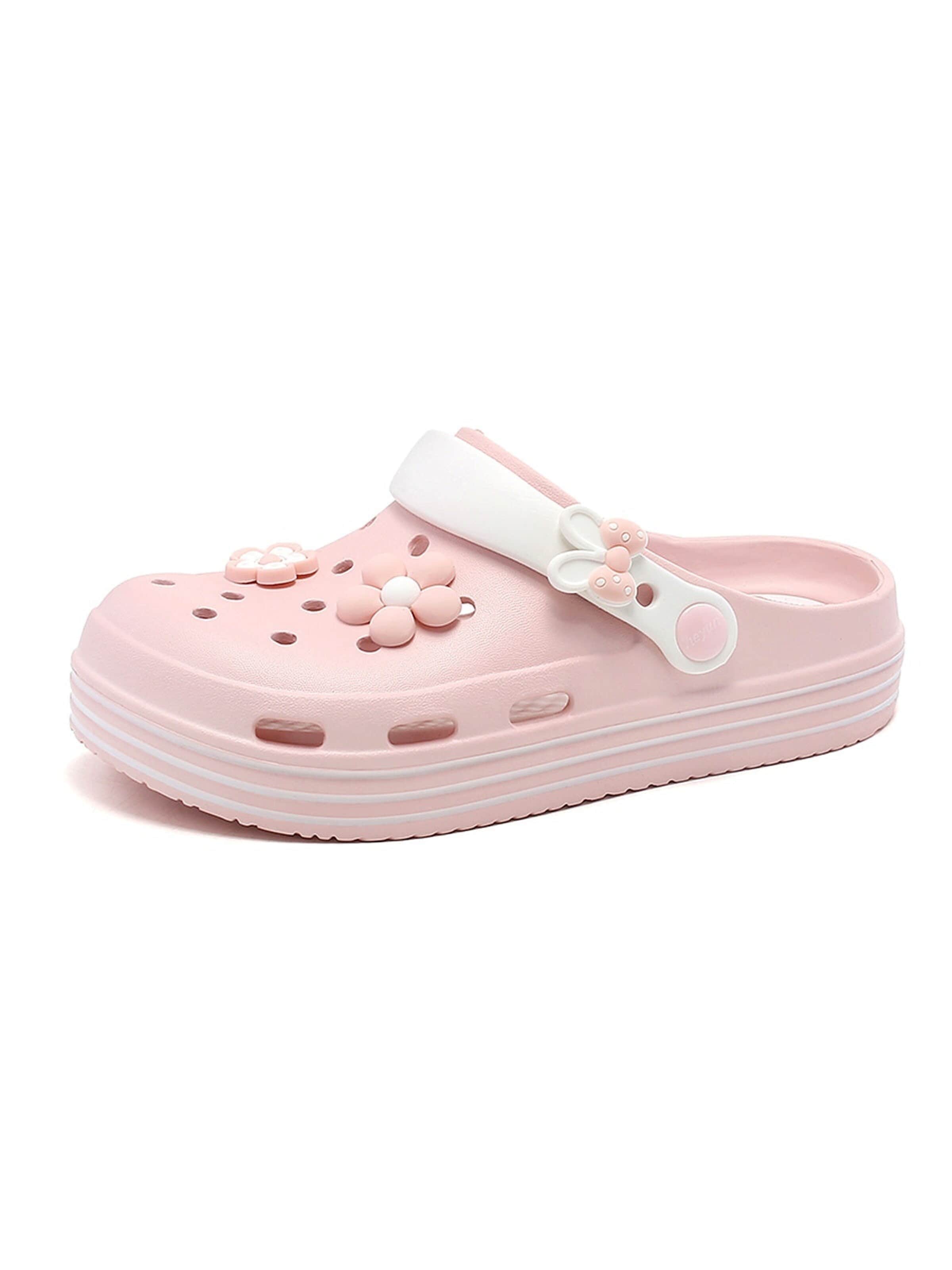 HUSKSWARE Clogs in Pink: front