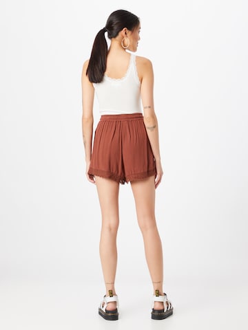 ABOUT YOU Loose fit Pants 'Dorina' in Brown