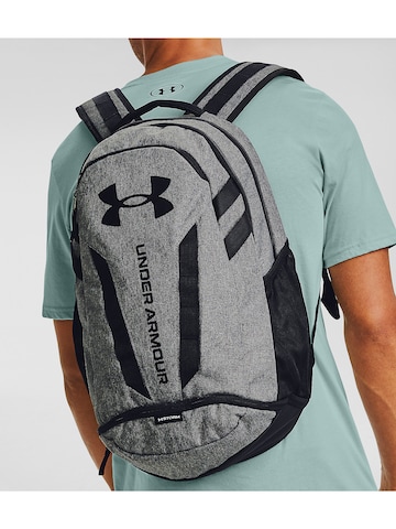 UNDER ARMOUR Sportrucksack 'Hustle' in Grau