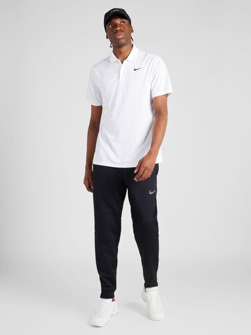 NIKE - Camiseta funcional en blanco