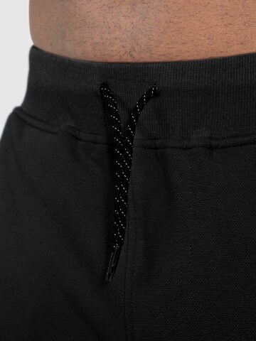 Effilé Pantalon 'Jones' Smilodox en noir