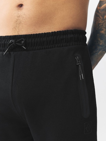 Next Tapered Bukser 'Athleisure' i sort