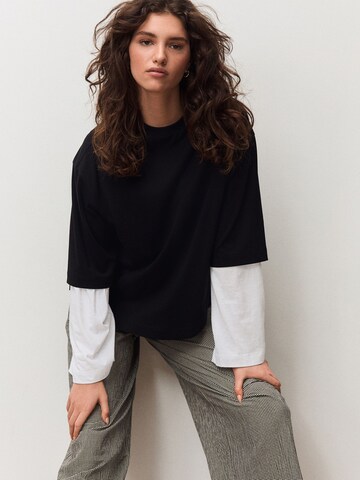 Next - Camisa em preto: frente