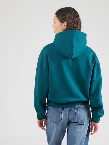 Calvin Klein Mikina – modrá: zadní strana