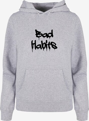 Merchcode Sweatshirt 'Bad Habits' in Grijs: voorkant