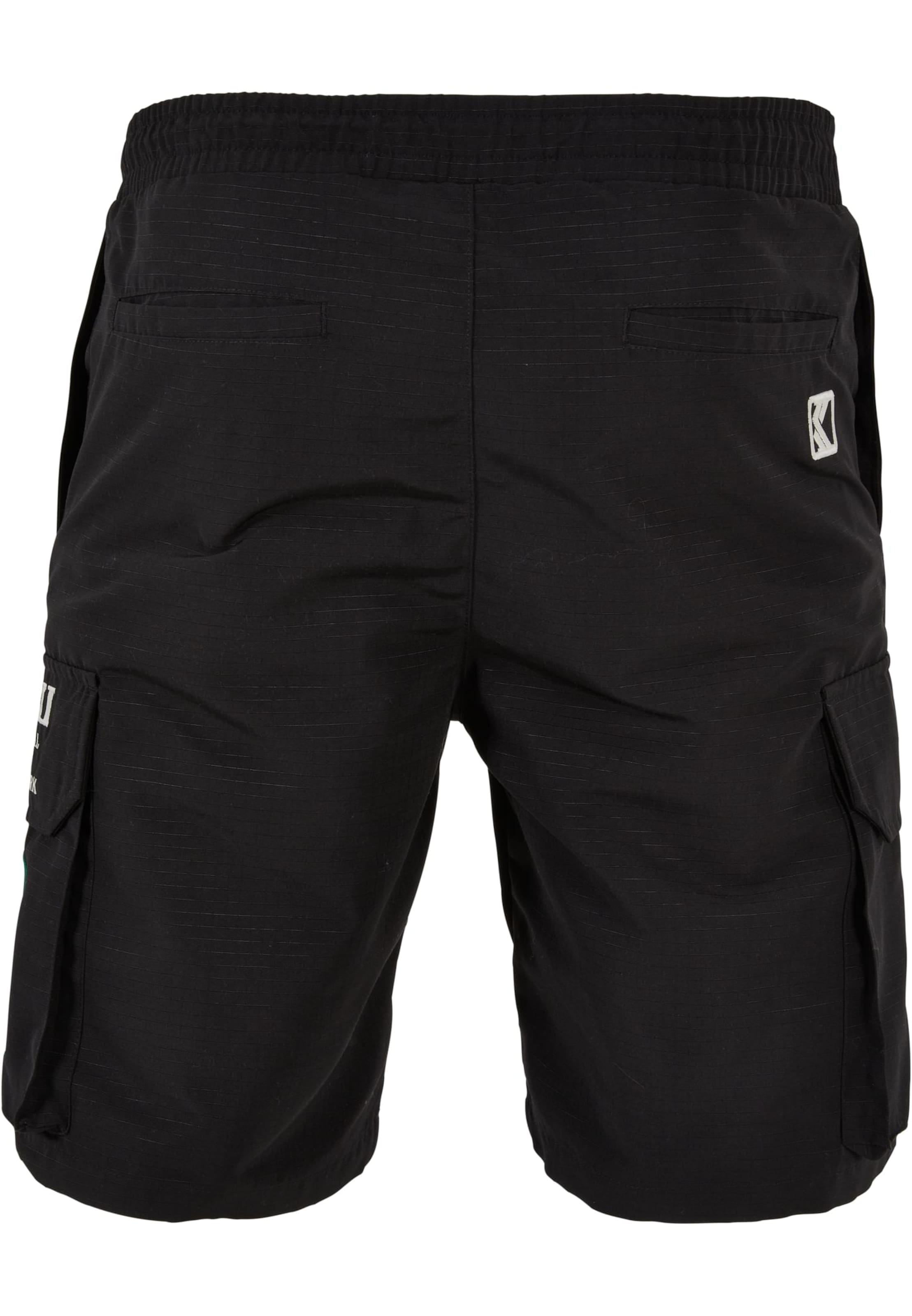 regular Pantaloni di Karl Kani in nero