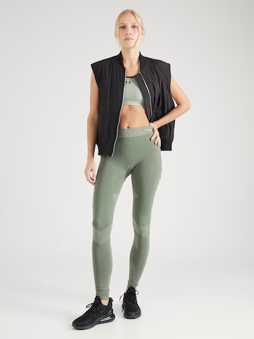 HummelSkinny Sportske hlače 'First' - zelena boja