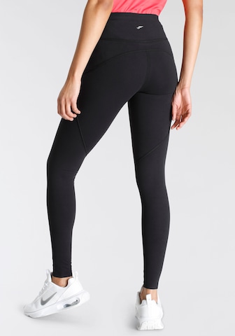 FAYN SPORTS Skinny Workout Pants in Black: front