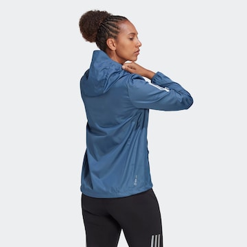 ADIDAS SPORTSWEAR Sportovní bunda 'Own The Run ' – modrá