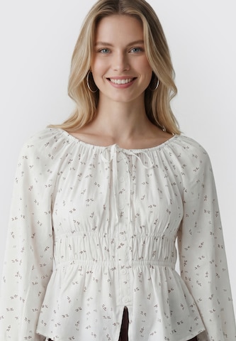 Usha - Blusa en blanco