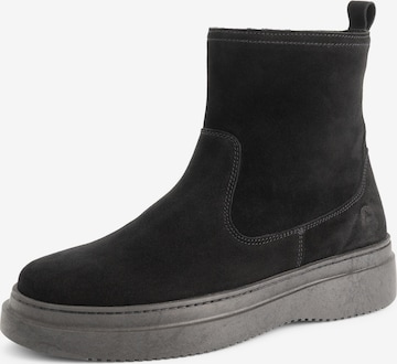 Travelin Boots i sort: forside