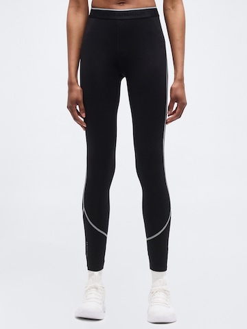 Skinny Pantalon de sport 'Elite' UNDER ARMOUR en noir : devant
