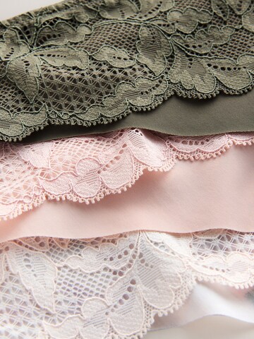 String di Next in colori misti