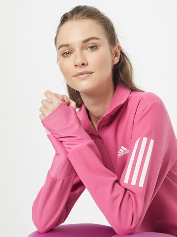 ADIDAS SPORTSWEAR - Sweatshirt de desporto 'Own The Run ' em rosa