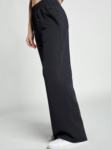 évasé Pantalon de sport 'Wide Training Pants' SPORTKIND en noir
