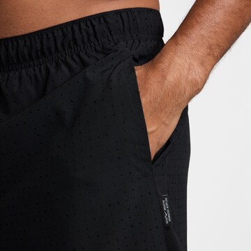 NIKE Regular Workout Pants 'Challenger' in Black