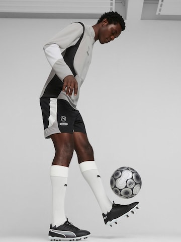 PUMA - Zapatillas de fútbol 'Puma King Pro FG AG' en negro