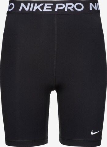 NIKE Skinny Workout Pants in Black: front