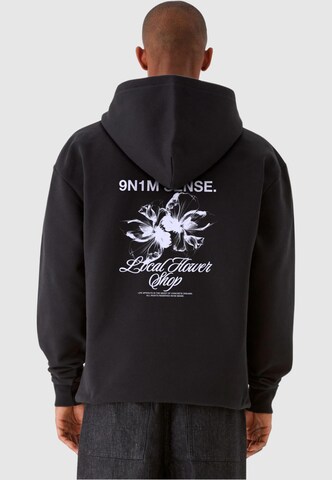 9N1M SENSE Sweatshirt 'LOCAL FLOWER SHOP' in Schwarz: predná strana